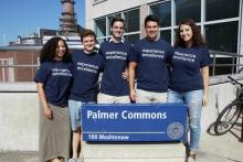 Student Building Managers in front of Palmer Commons Sign