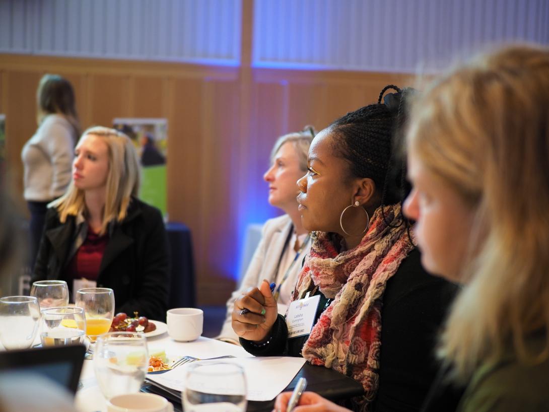 People at a table with food